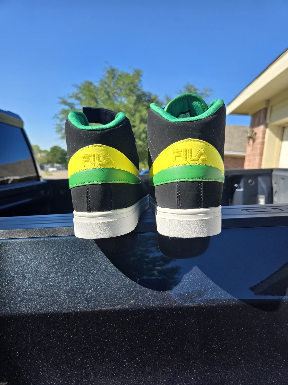 FILA Black High Top Sneakers with Green and Yellow Accents - Picture 3 of 13